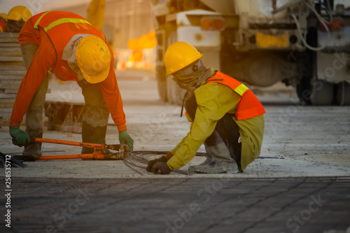 Construction worker team, The construction team is cutting steel 