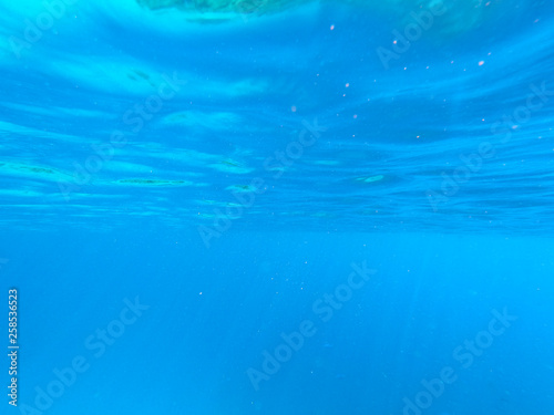 Beautiful texture of the sea and ocean water. blue background. Underwater photography. Red Sea, Egypt.