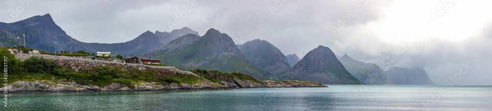 rainy cloud over a fjord on Senja island in Norway