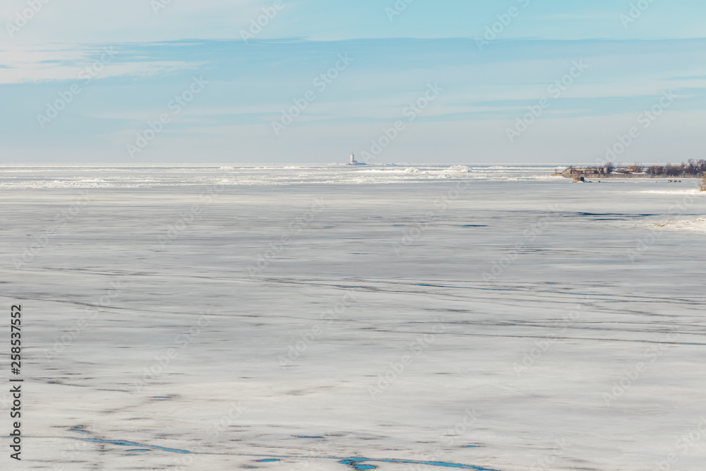 Kronshtadt. Tolbukhin lighthouse in the Gulf of Finland. Ice hummocks.