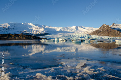 Reflection in frozen water of Glacier in Iceland