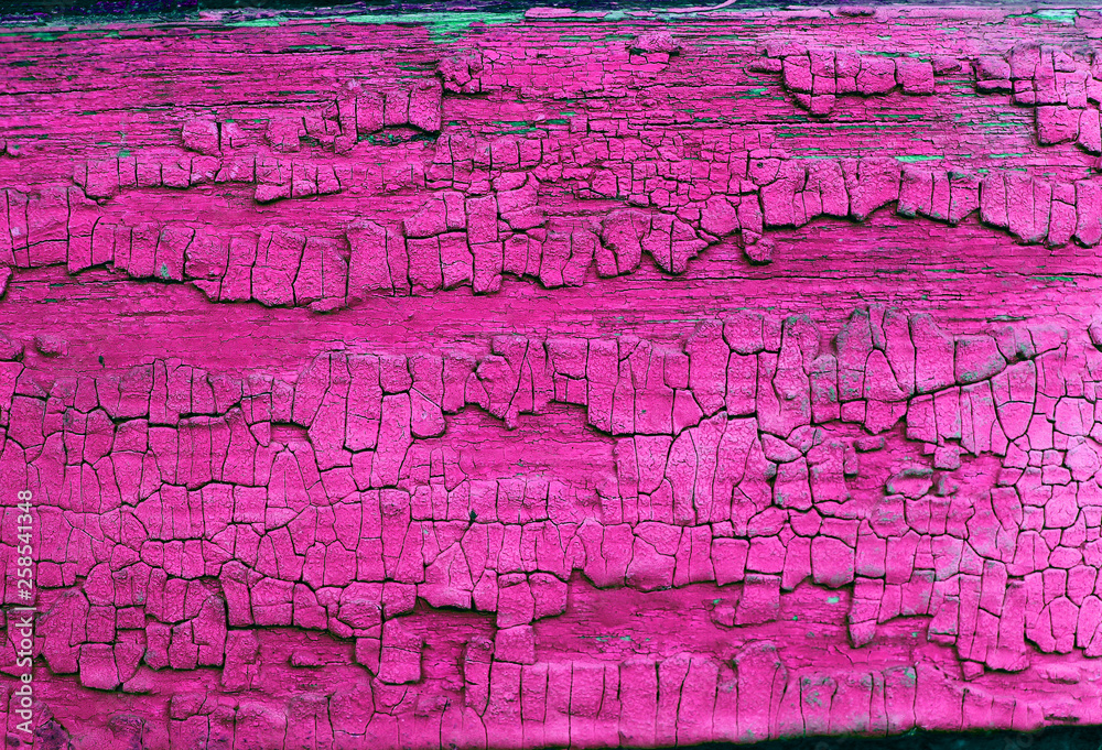 Obraz premium Old wooden background with remains of pieces of scraps of old paint on wood. Texture of an old tree, vintage wood background peeling paint. old blue board with cracked paint
