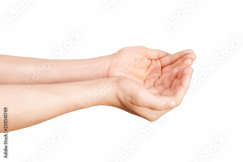 Hands on a white background extend forward with palms up like if they hold something in them