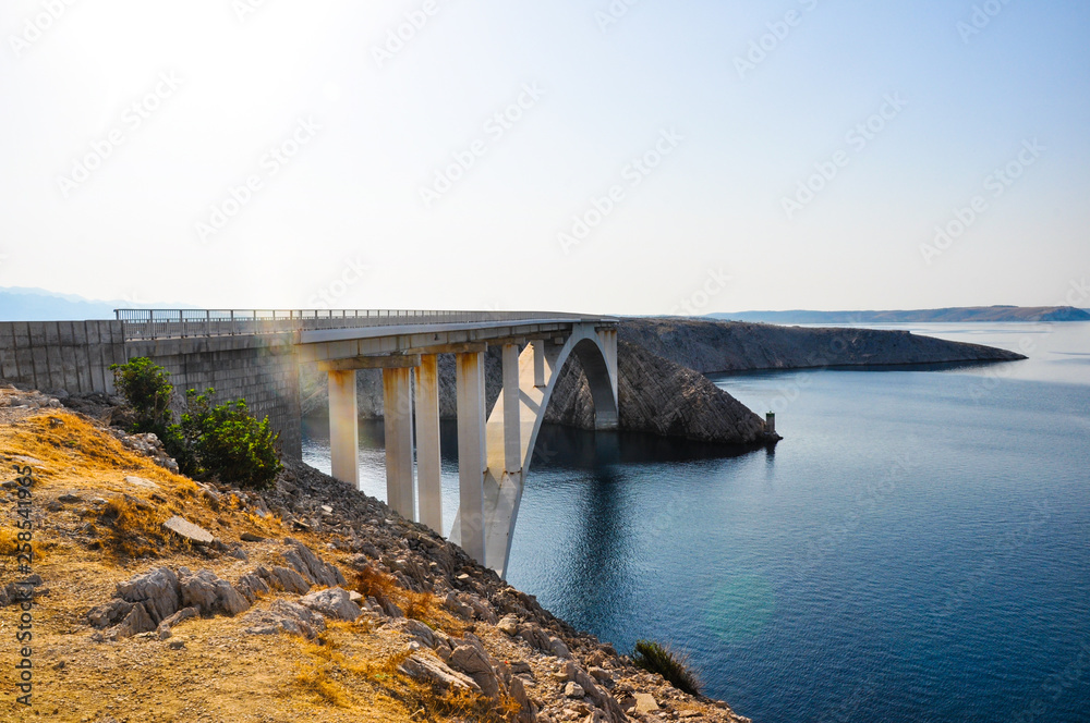 Paski bridge on croatian island Pag, seen from the side. Croatian roads and coast