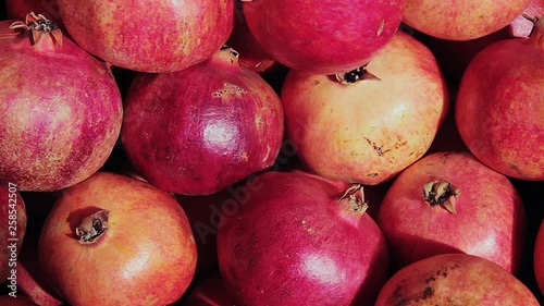 fresh pomegranates on the market photo