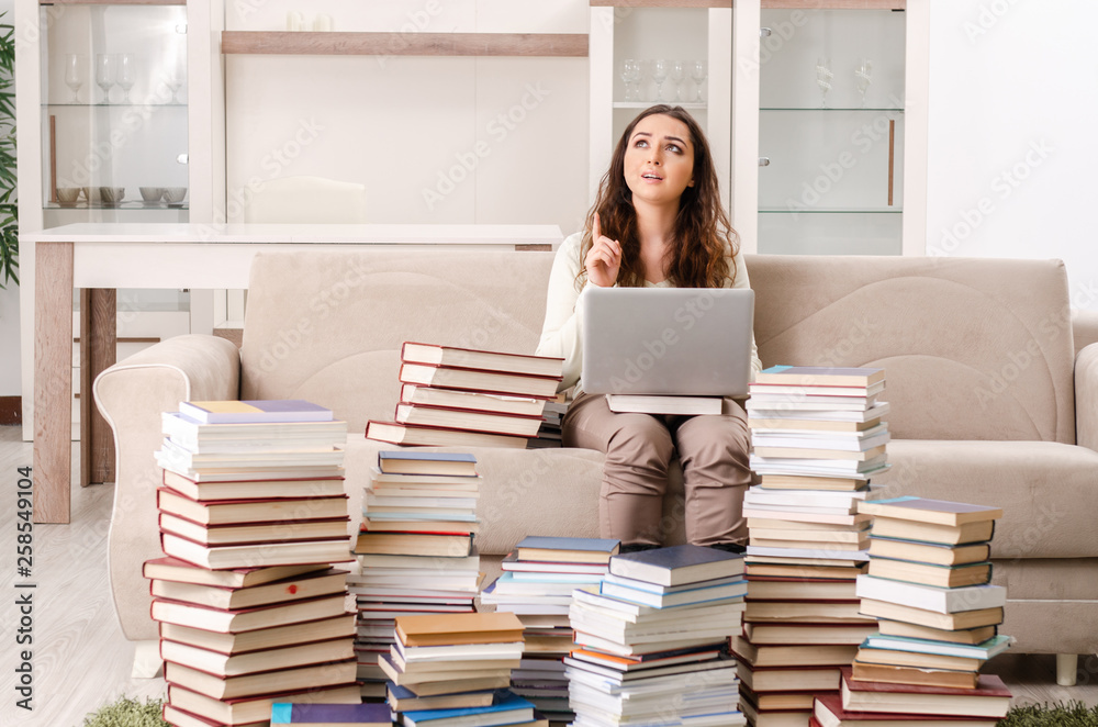 Young female student preparing for exams at home Young female student preparing for exams at home