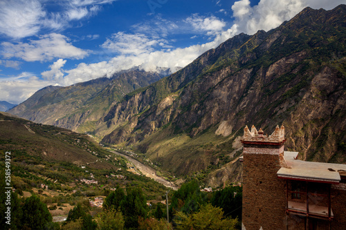 Epic Mountains and Deep Canyon in China - Danba County, Sichuan Province China. Zhonglu Township, Architectural Style of Jiuaju Ancient Tibetan Village. Traditional Tibetan buildings. photo