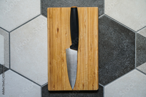 Wooden cutting board and knife