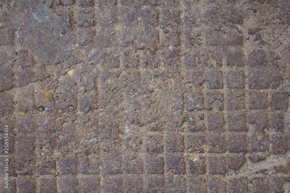 blue gray old checkered iron surface with dirt and bumps. rough texture