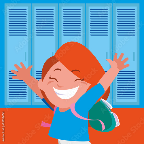 little schoolgirl with schoolbag in school corridor