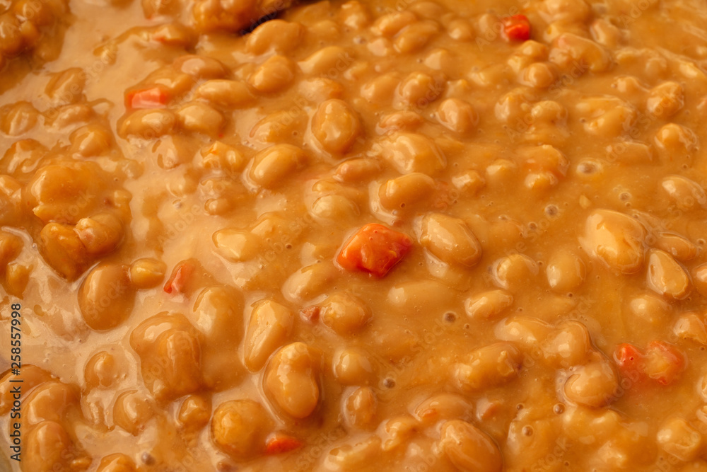 Hot baked beans with bacon in a tomato sauce Hot baked beans with bacon in a tomato sauce