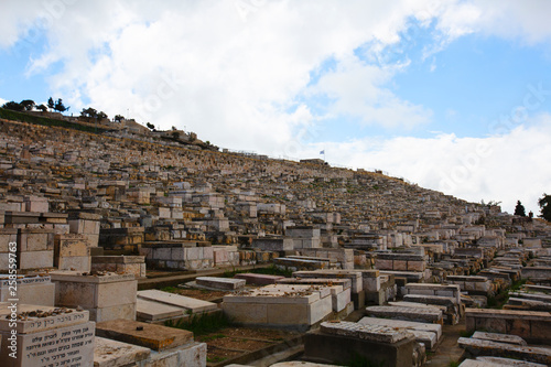 JERUSALEM, ISRAEL - MARCH 25, 2019: View to jewish cemetery and old Jerusalem 