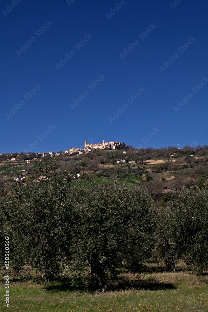 view of Moresco,Marche,Italy,village, tourism,medieval,old,view,sky,blue,spring 