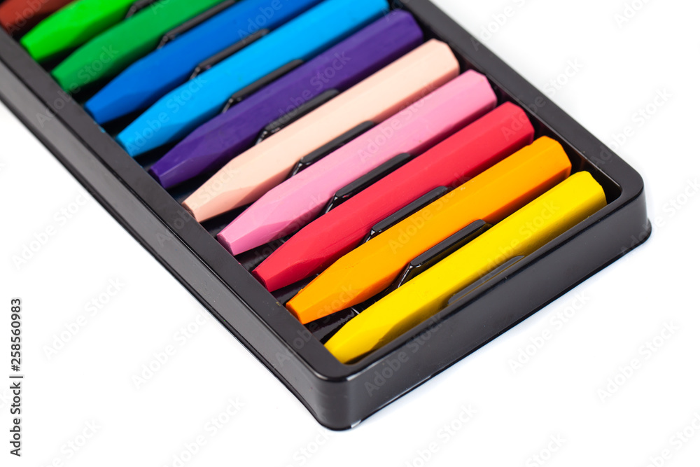 Group of crayons (pencils) stacked on white background Group of crayons (pencils) stacked on white background