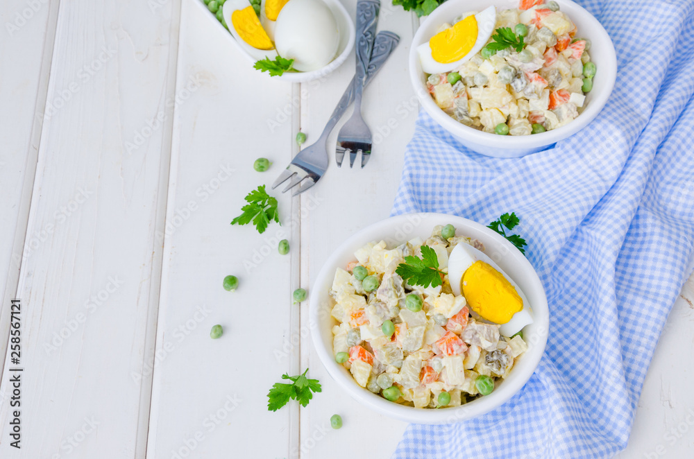 Russian traditional salad Olivier with vegetables and meat Russian traditional salad Olivier with vegetables and meat