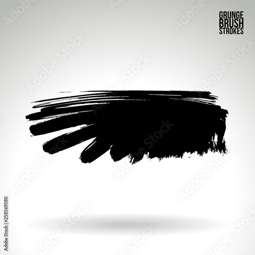Black brush stroke and texture. Grunge vector abstract hand - painted element. Underline and border design.