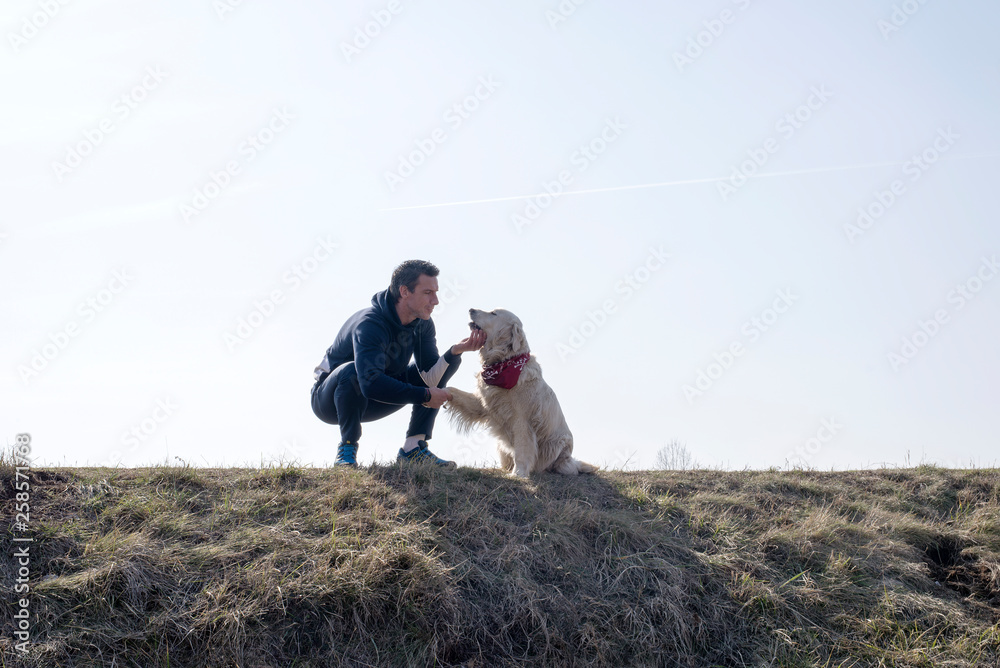 Man and dog in the nature
