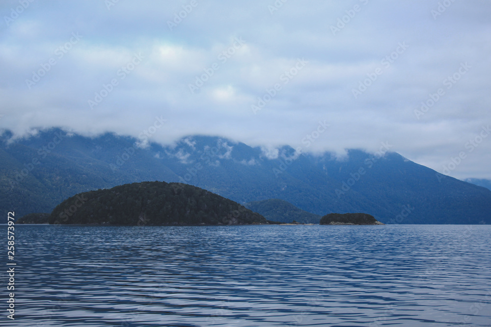 Doubtful Sound cruise - crossing Lake Manapouri before going to actual sounds, Fiordland National Park, South Island, New Zealand Doubtful Sound cruise - crossing Lake Manapouri before going to actual sounds, Fiordland National Park, South Island, New Zealand