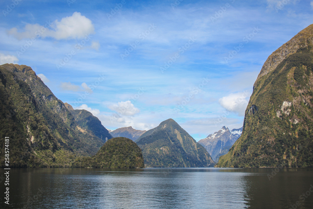 Doubtful Sound cruise - passing beautiful scenery in Fiordland National Park, South Island, New Zealand Doubtful Sound cruise - passing beautiful scenery in Fiordland National Park, South Island, New Zealand