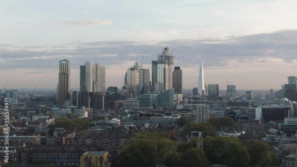 Aerial approaching view of the skyline of the city and central London from the North Aerial approaching view of the skyline of the city and central London from the North