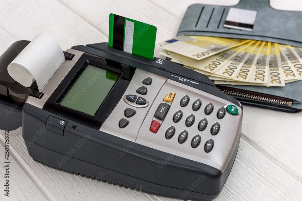 Banking terminal with euro in wallet and credit card Banking terminal with euro in wallet and credit card