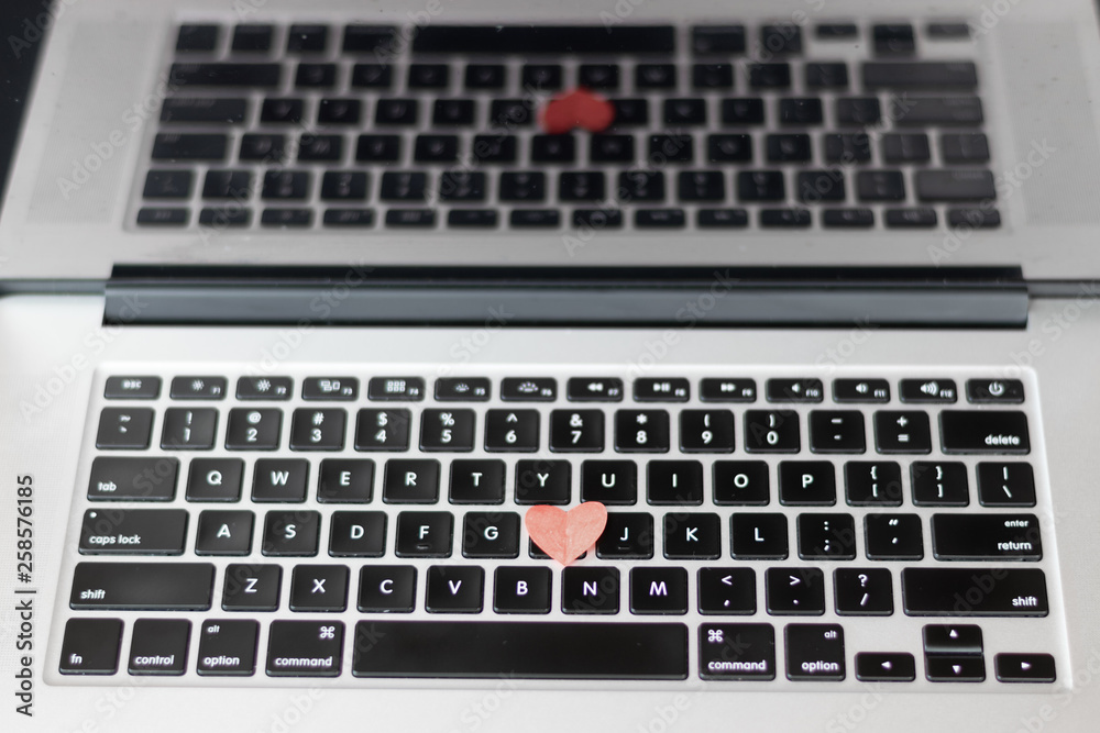 Heart on the keyboard, dating online concept Heart on the keyboard, dating online concept