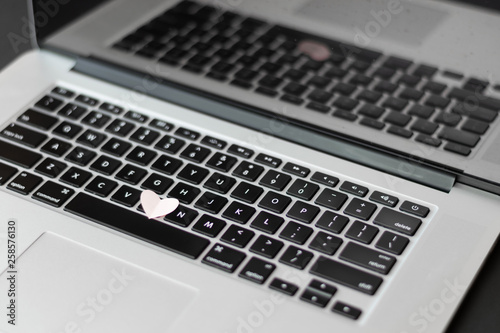 Heart on the keyboard, dating online concept 