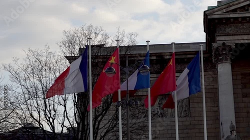 French and Chinese flags in the wind in front of National Assembly for Xi Jinping visite in france in March 2019 photo