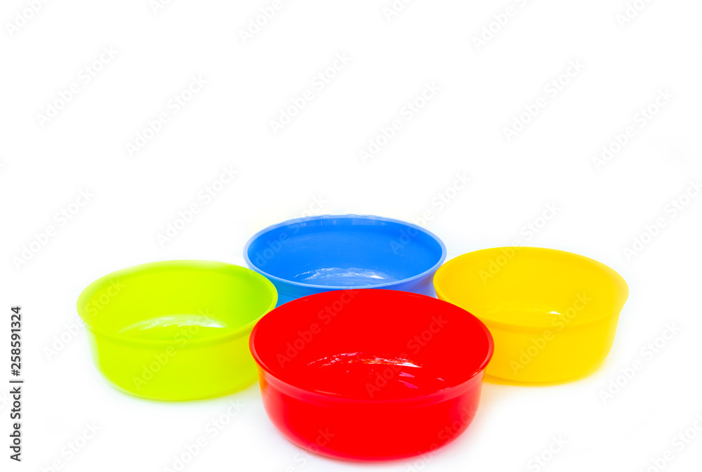 Plastic Water Bowl colorful on isolated white background Plastic Water Bowl colorful on isolated white background
