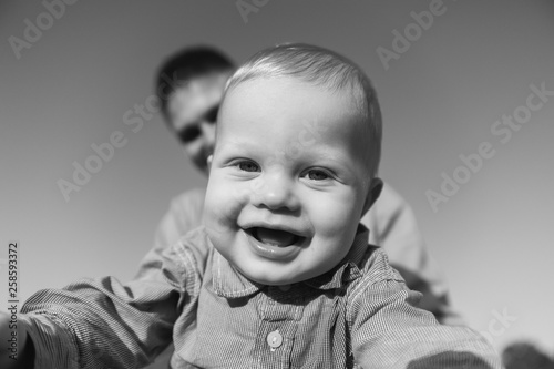 The portrait of smiling baby boy