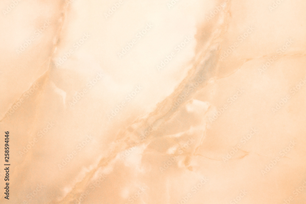 ceramic tile with a pattern of natural marble of orange color