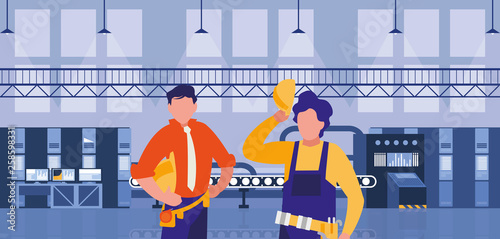 couple of men working in factory