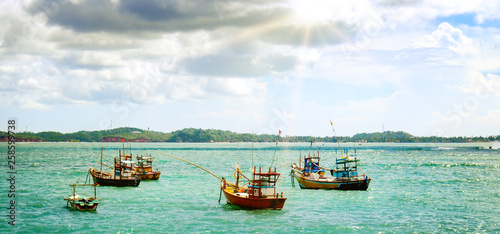 Photos Beautiful seascape with fishing boats on the water