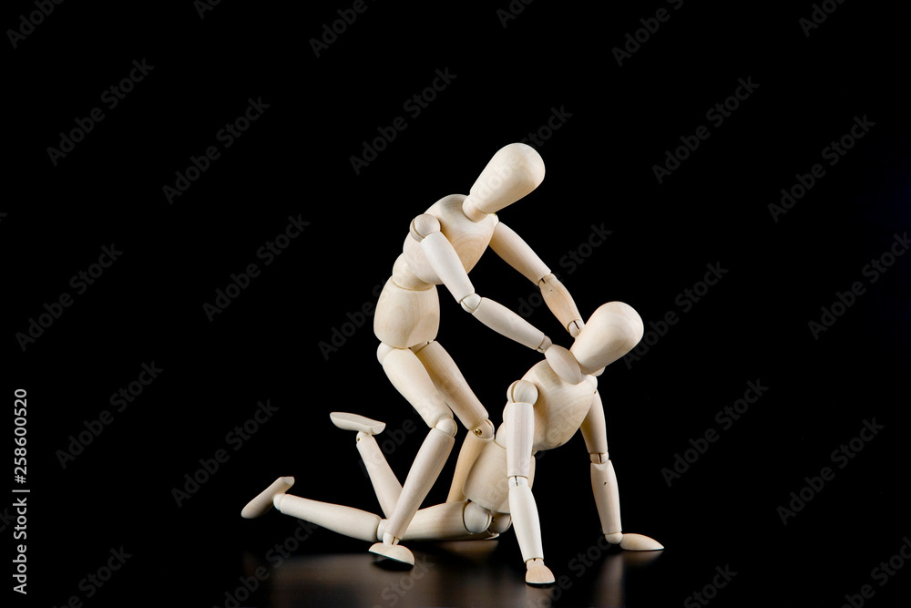Mannequin dolls in interaction isolated on black background Mannequin dolls in interaction isolated on black background