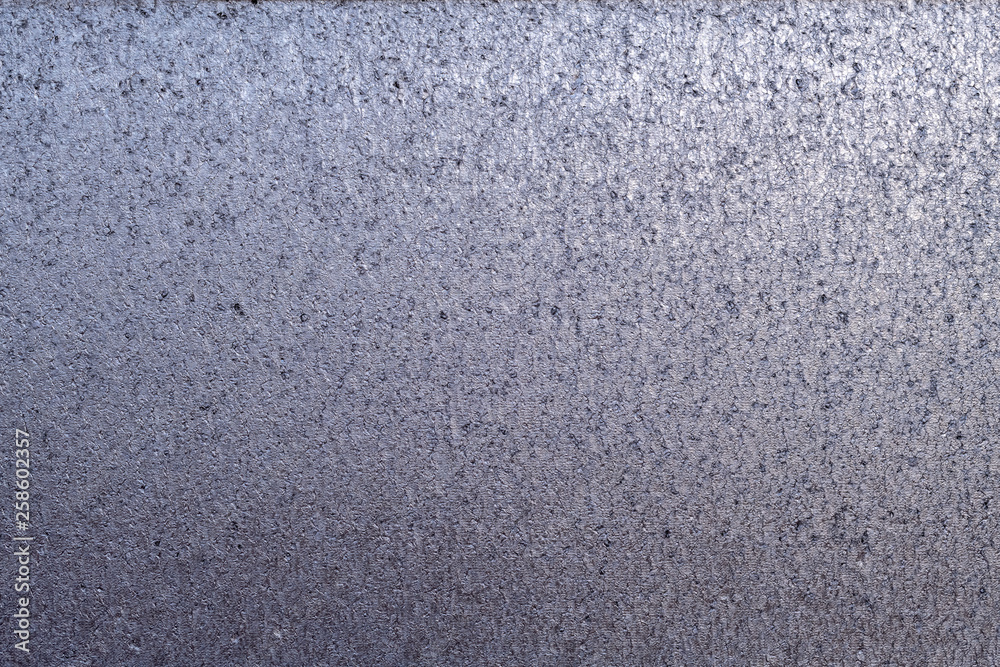 Detailed metallic texture of compressed melted and hammered and dented metal with gradient of shades Detailed metallic texture of compressed melted and hammered and dented metal with gradient of shades