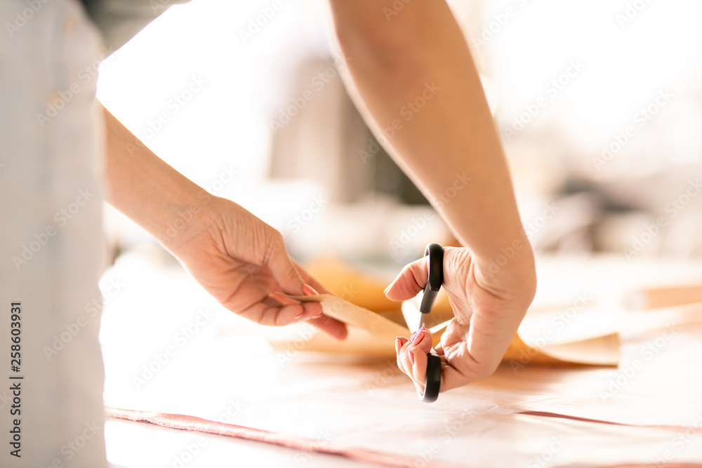 Hands of seamstress Hands of seamstress