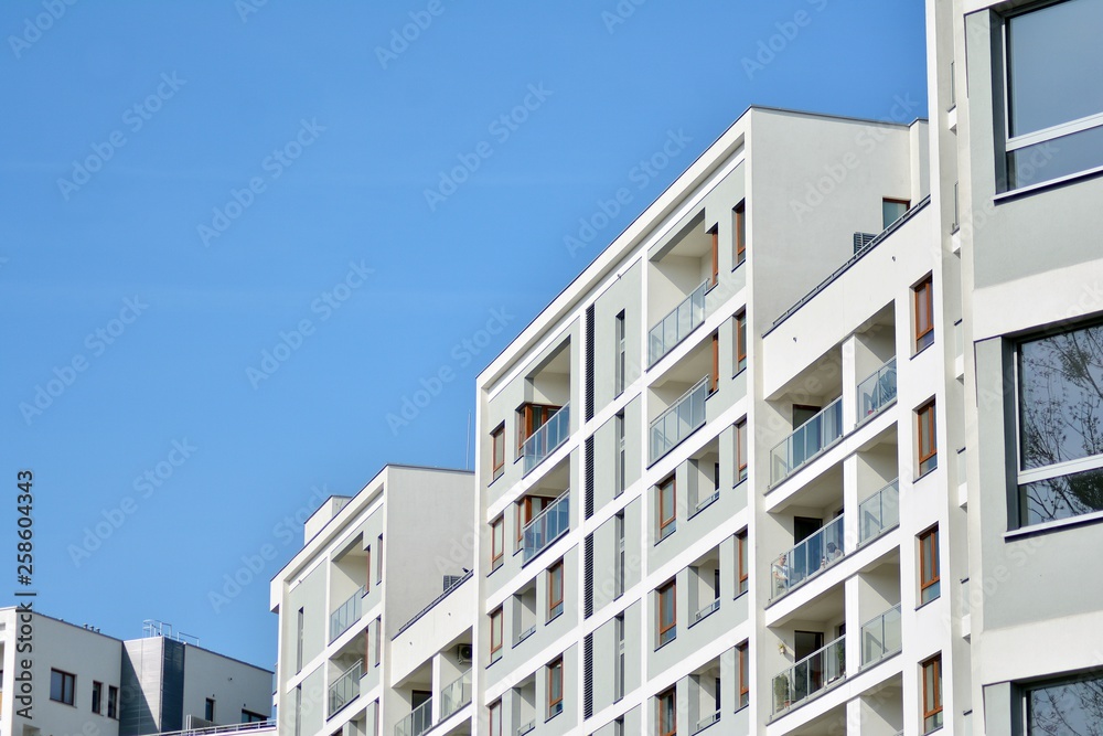 Fragment of a modern apartment building in front. Very modern apartment house. Fragment of a modern apartment building in front. Very modern apartment house.