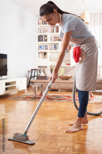 woman cleaning home daily routine