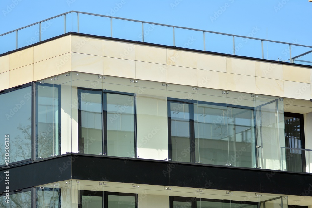Fragment of a modern apartment building in front. Very modern apartment house. Fragment of a modern apartment building in front. Very modern apartment house.