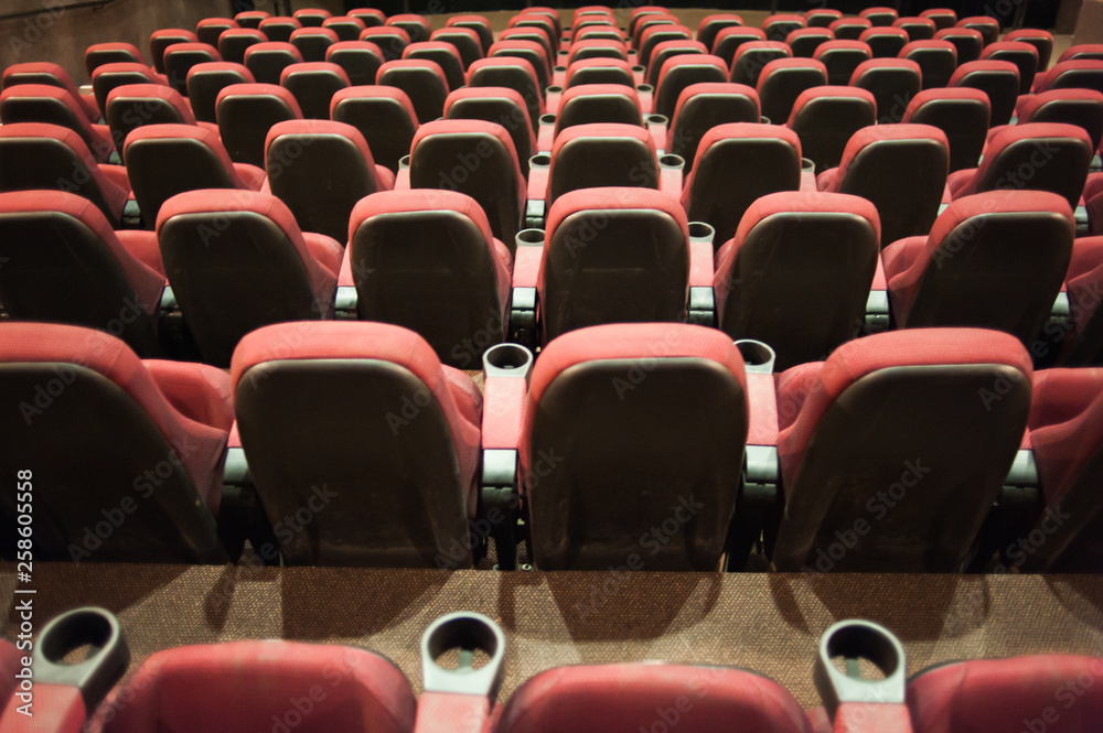 Fototapeta premium part of a theatre, or similar building, where the people who are watching and listening sit