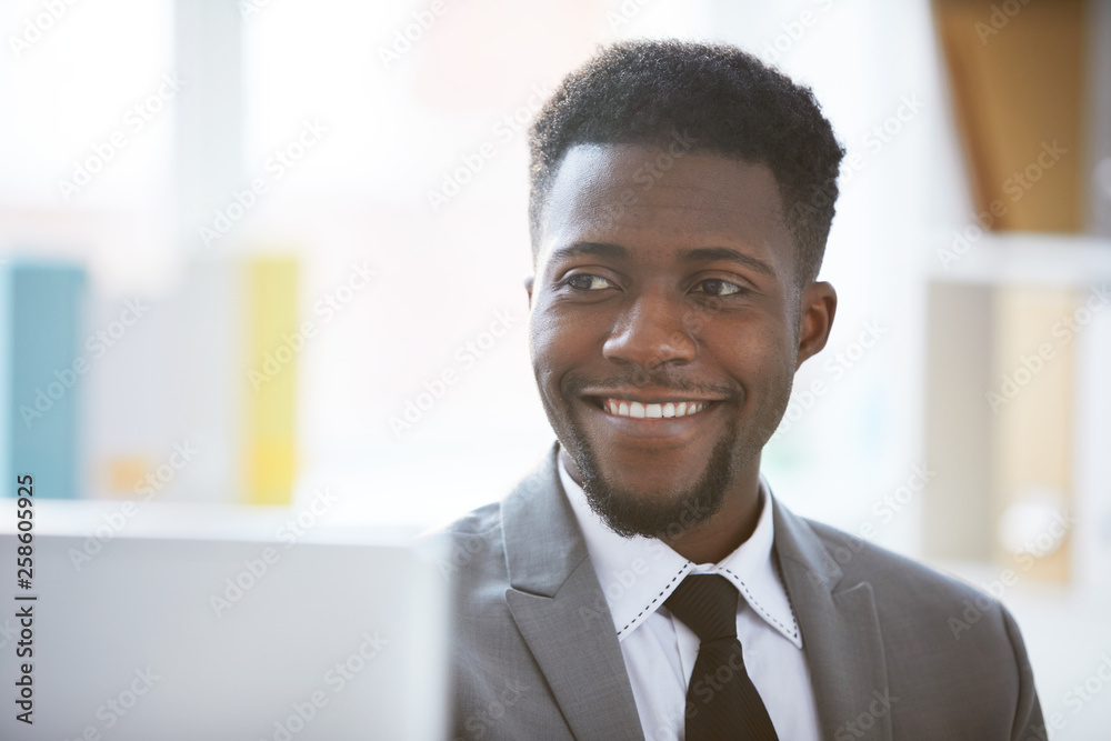 Man in front of laptop Man in front of laptop
