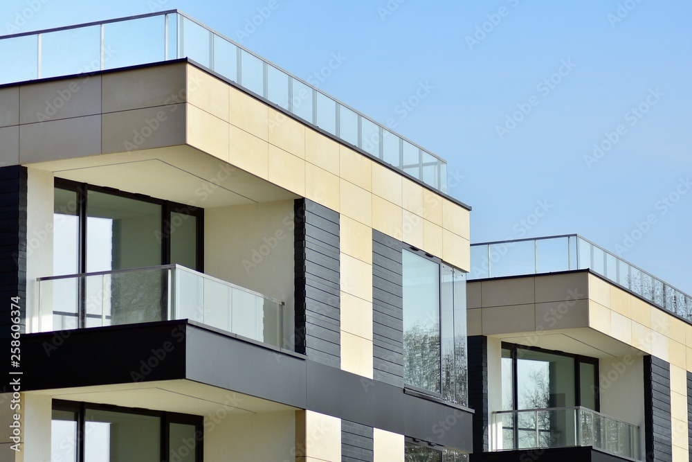 Fragment of a modern apartment building in front. Very modern apartment house. Fragment of a modern apartment building in front. Very modern apartment house.
