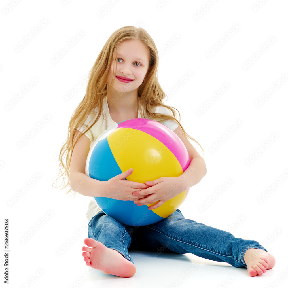 Little girl is playing with a ball Little girl is playing with a ball