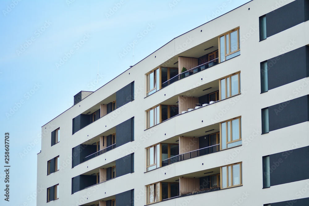 Fragment of a modern apartment building in front. Very modern apartment house. Fragment of a modern apartment building in front. Very modern apartment house.