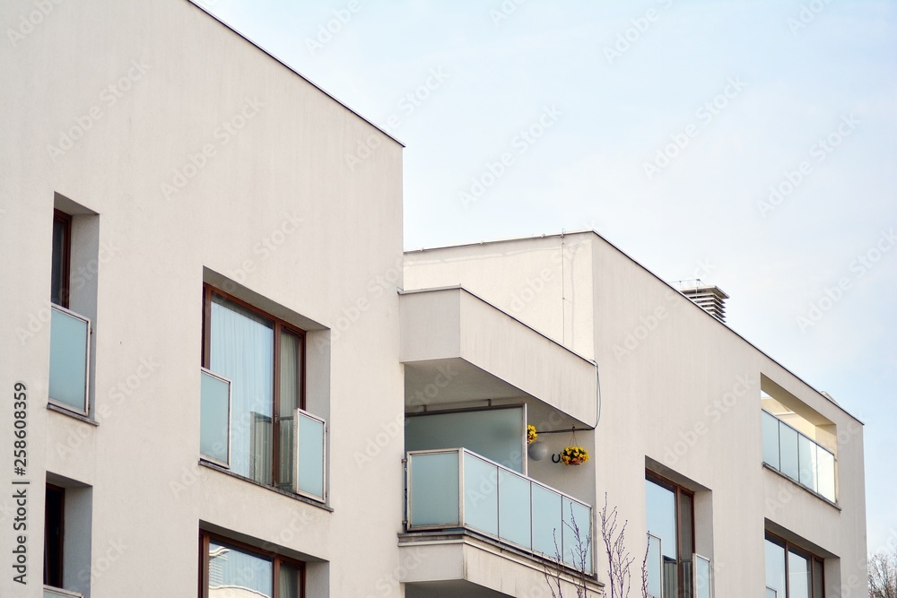 Fragment of a modern apartment building in front. Very modern apartment house.