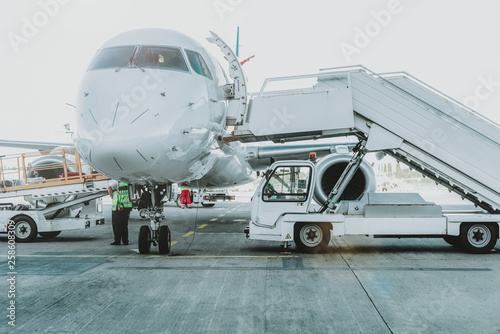 Huge airplane being prepared to receive passengers