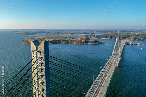 Raippaluoto, Finland - October 14, 2018: Longest bridge of Finland at Raippaluoto captured with drone on sunny day photo