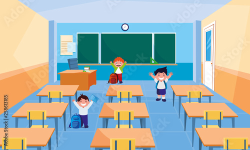 happy little schoolboys in the classroom