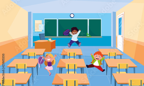 happy little interracial school kids in the classroom