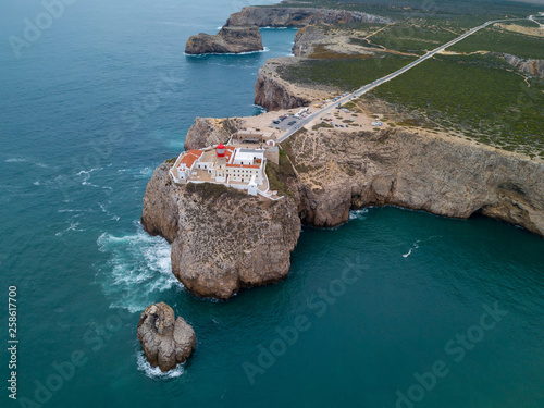 Aerial drone panoramic view of the lighthouse and cliffs at Cape St. Vincent at sunset. Algarve seascape.  Amazing landscape.Continental Europe's most South-western point, Sagres, Portugal.